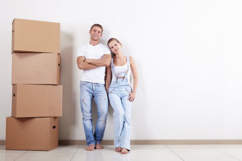 Removal team preparing a move in Edgware with boxes and furniture