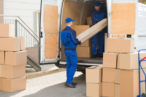 Student removals team assisting with boxes in Edgware