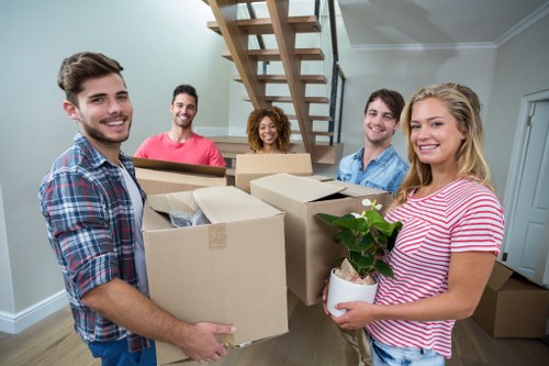 Moving crew loading household items during a removal service