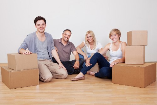 Professional movers handling office furniture during an Edgware relocation